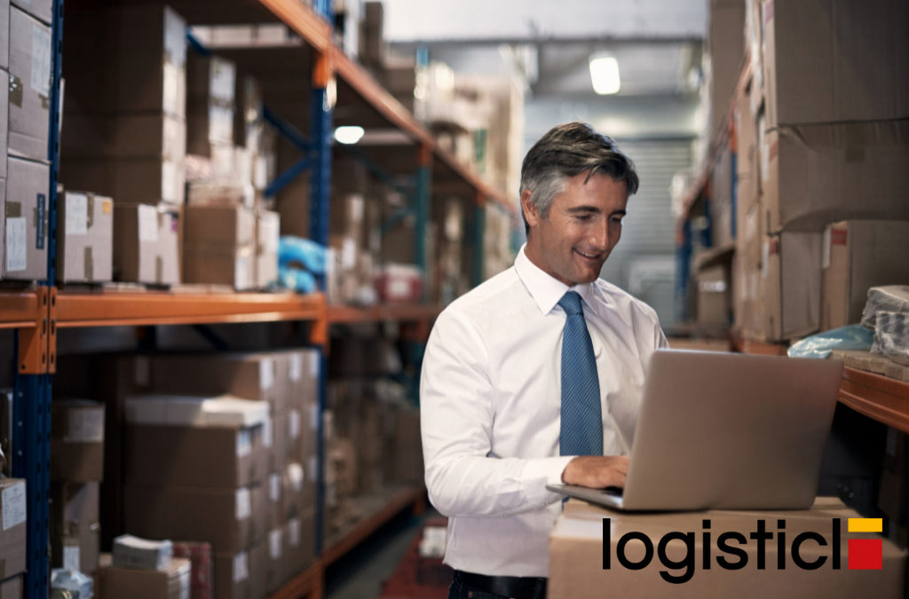 This image features a man working on logistics in a warehouse to demonstrate the importance of logistics.